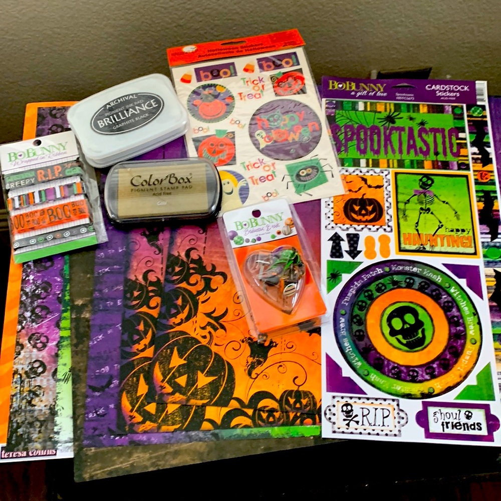 Lot of Halloween theme scrapbook supplies.